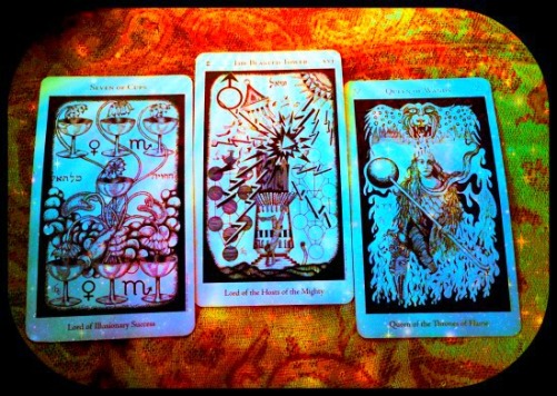 I. Seven of Cups II. The Tower III. The Queen of Wands